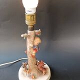 Goebel design Hummel ceramic lamp base with child on an apple tree, 1960s