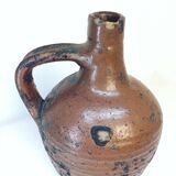 Small terracotta pitcher with handle