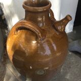 Varnished oil jug