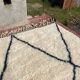 Very large vintage Beni Ouarain rug in cream wool with black diamonds, 426x344cm.