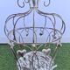 Decorative bird cage with iron hearts