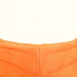 Togo sofa set and armchairs in pumpkin orange, 3 pieces, no label.