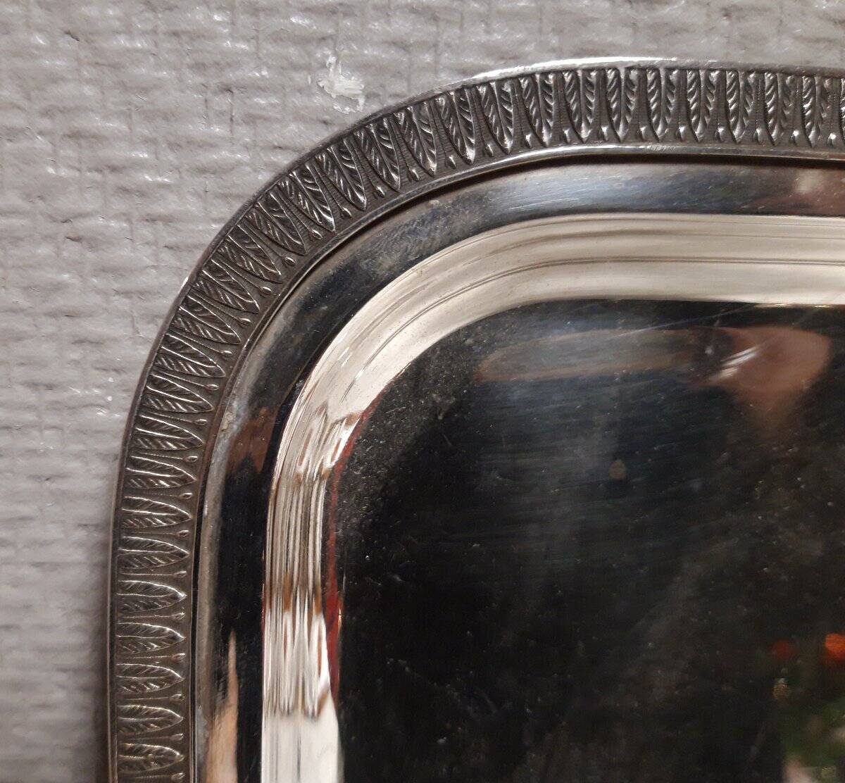 Silver-plated service tray with handles, neoclassical decoration.