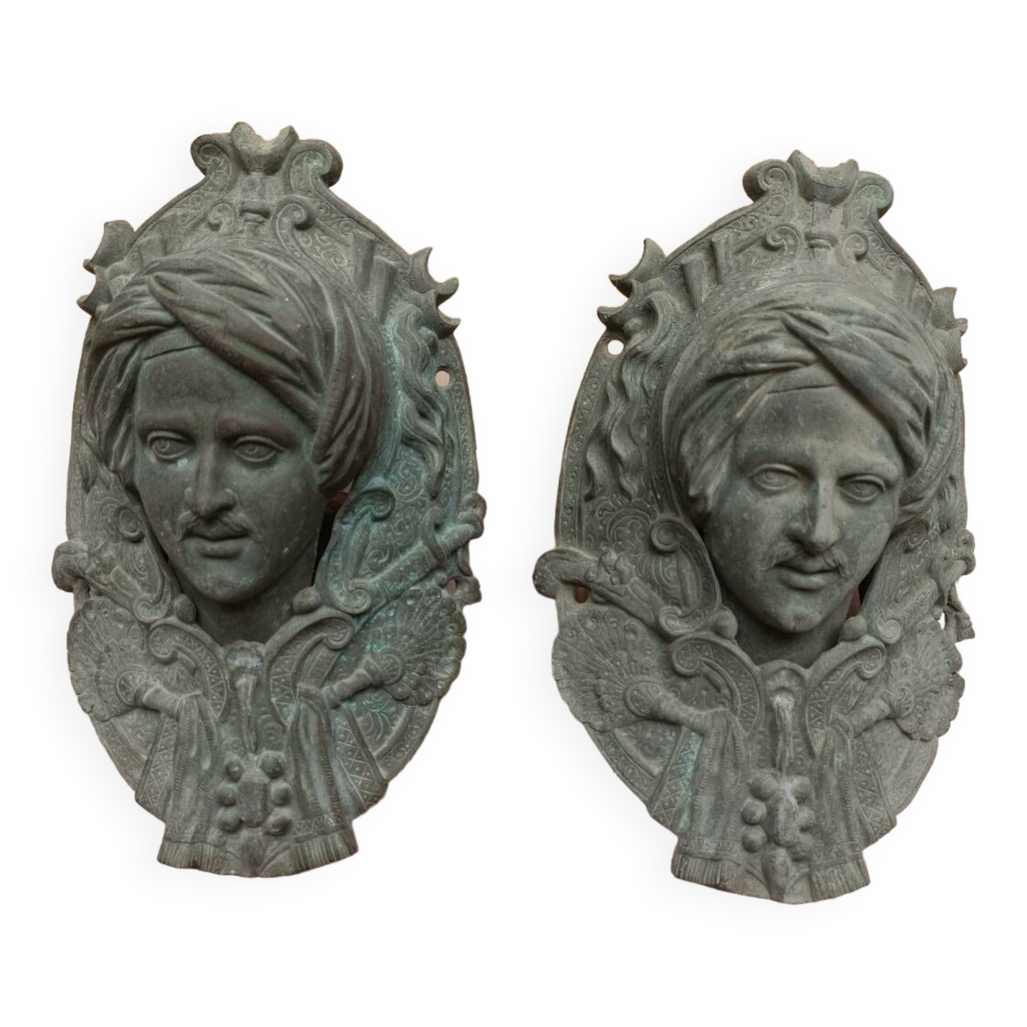 Bronze door knockers and billiard table corners