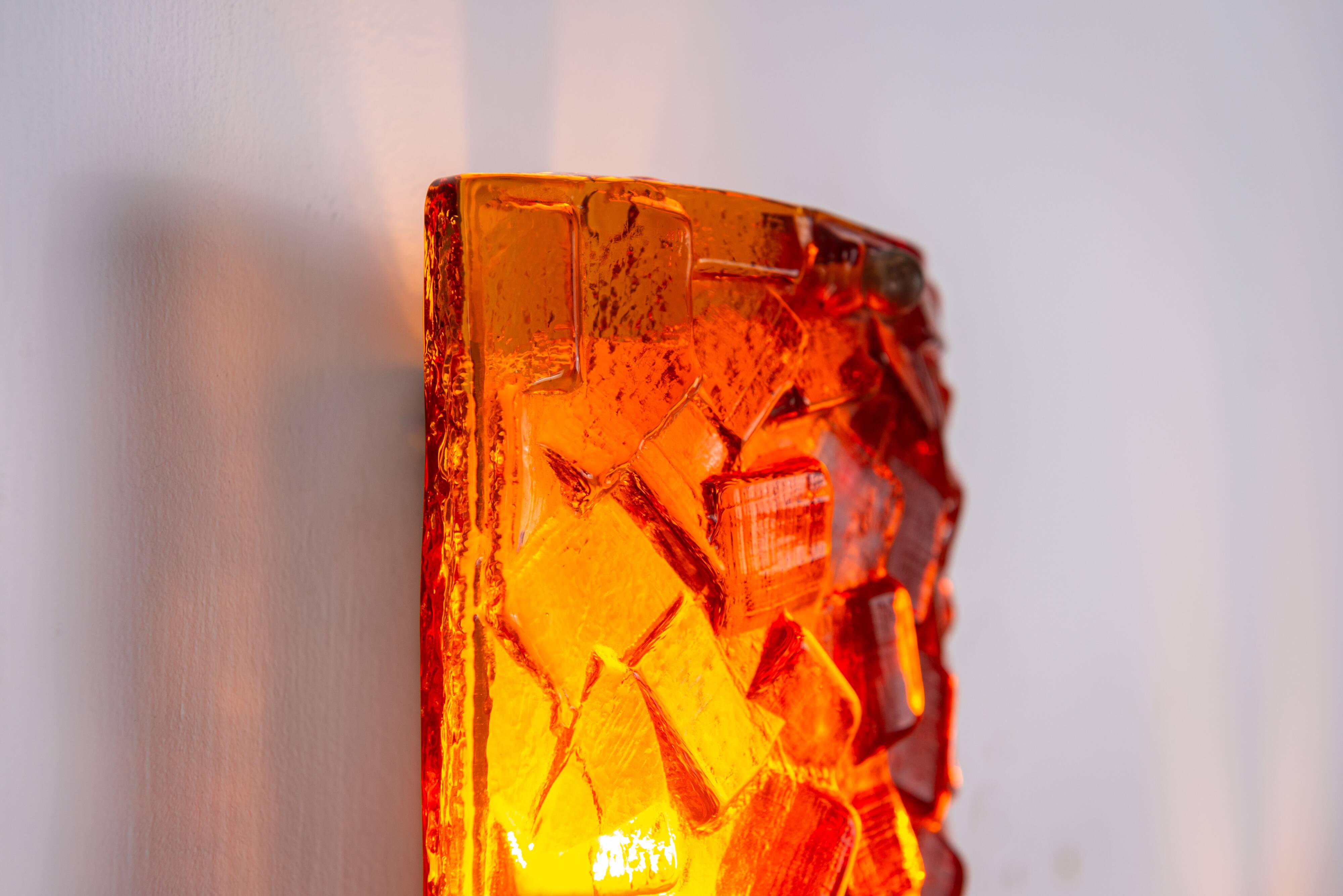 Vitrika Nybro amber coloured wall lamps