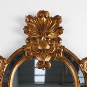 Miroir rococo-vénitien belge du XXe siècle en bois doré