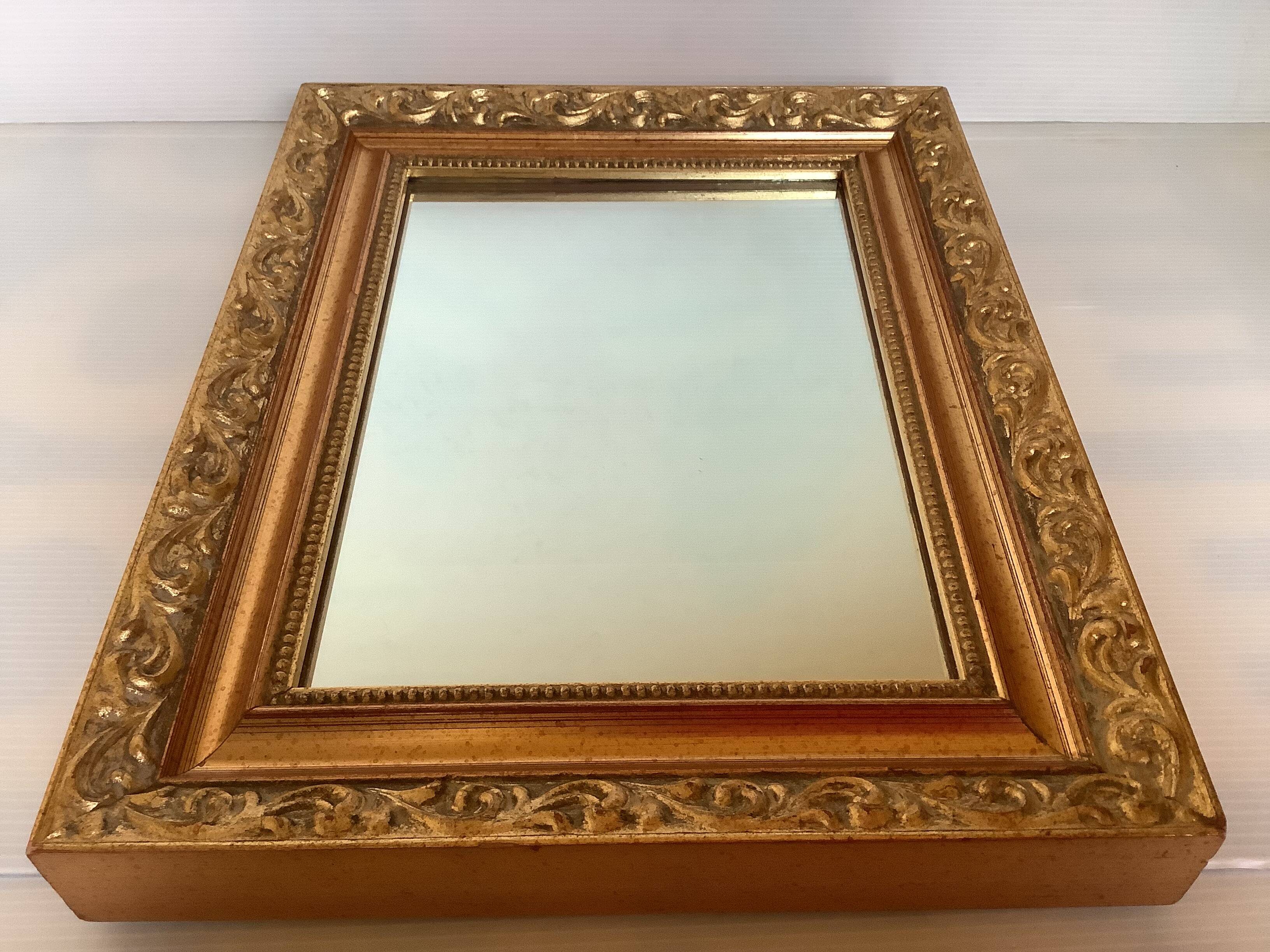Gilded wooden beaded mirror