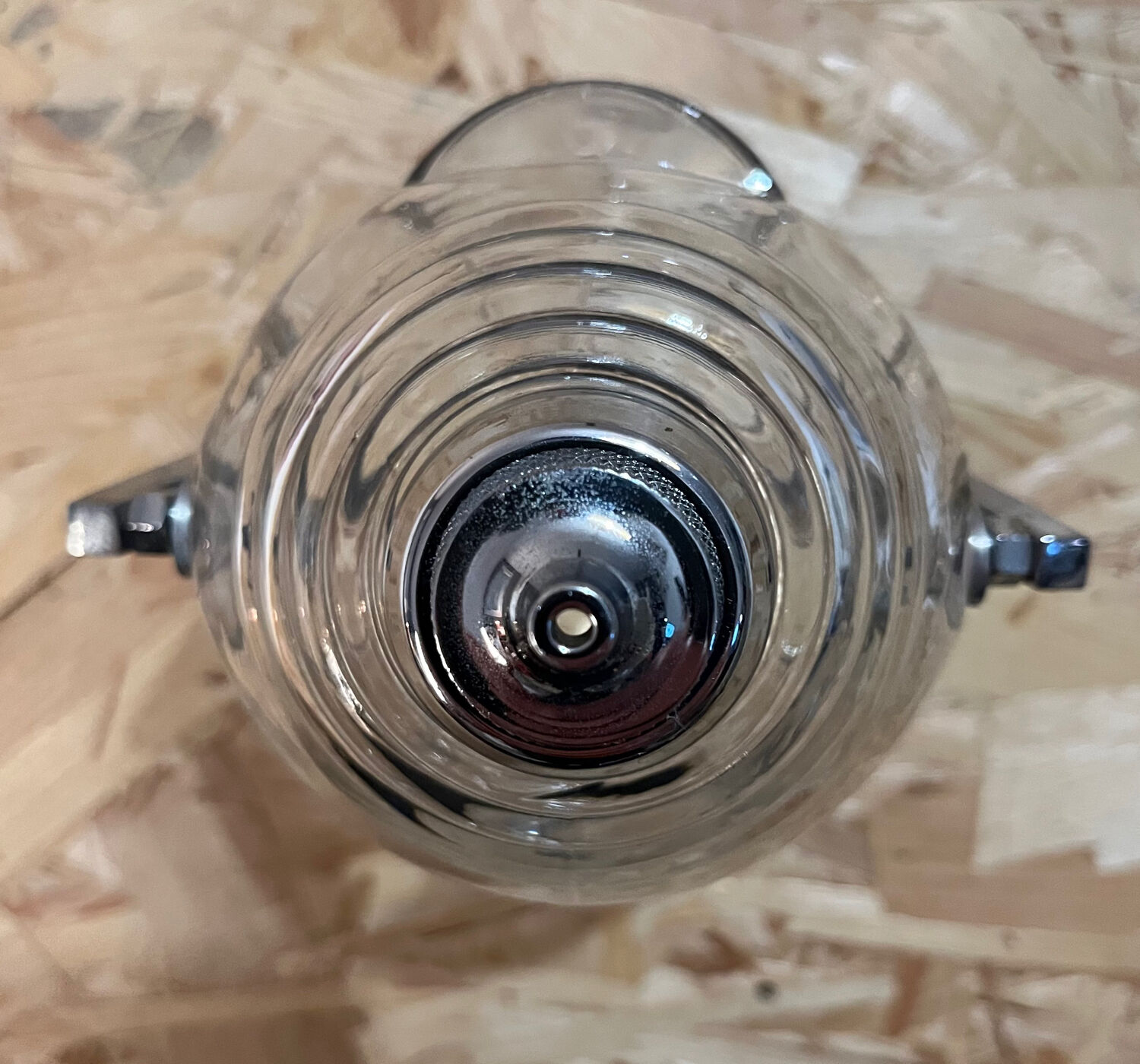 Old glass and metal liquid soap dispenser
