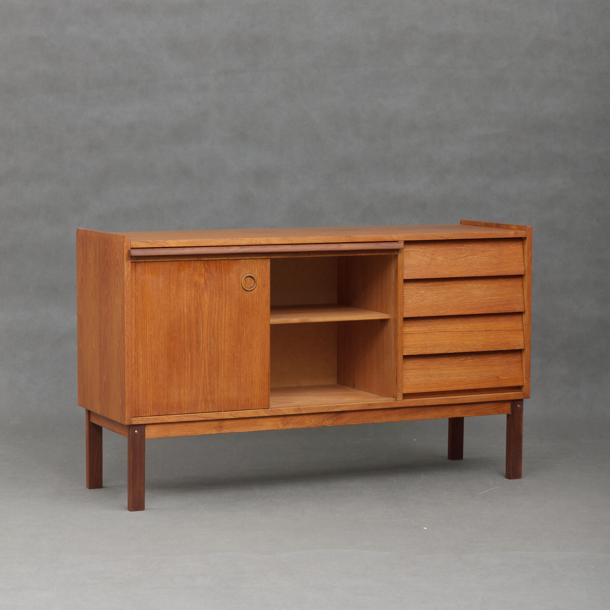 Small Danish teak sideboard with a pull out tray