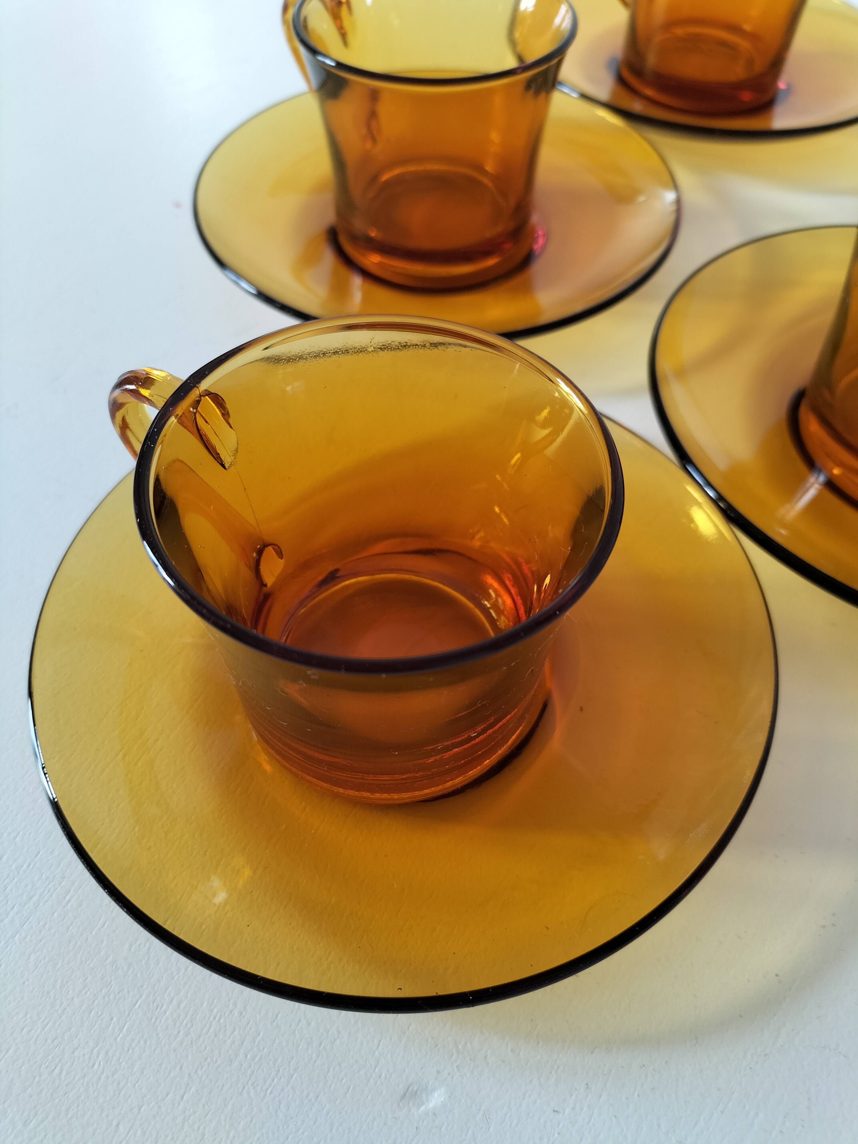 5 vintage amber Duralex cups and saucers