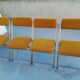 4 folding gold vintage Eyrel chairs