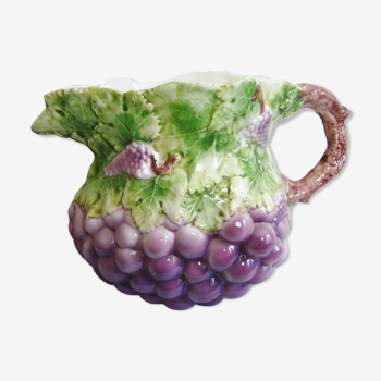 Pitcher in vintage slurry decorated with grapes