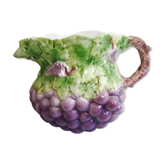 Pitcher in vintage slurry decorated with grapes