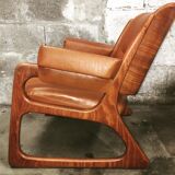 Armchair called "sled" Publisher Baumann and Ottoman