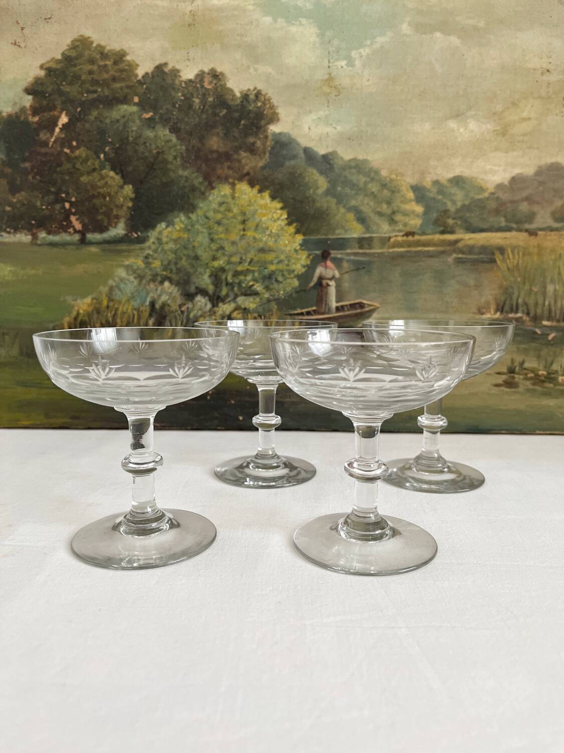 4 antique champagne glasses in engraved glass decor