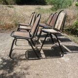 Set of 6 indu chairs in metal and exotic wood.