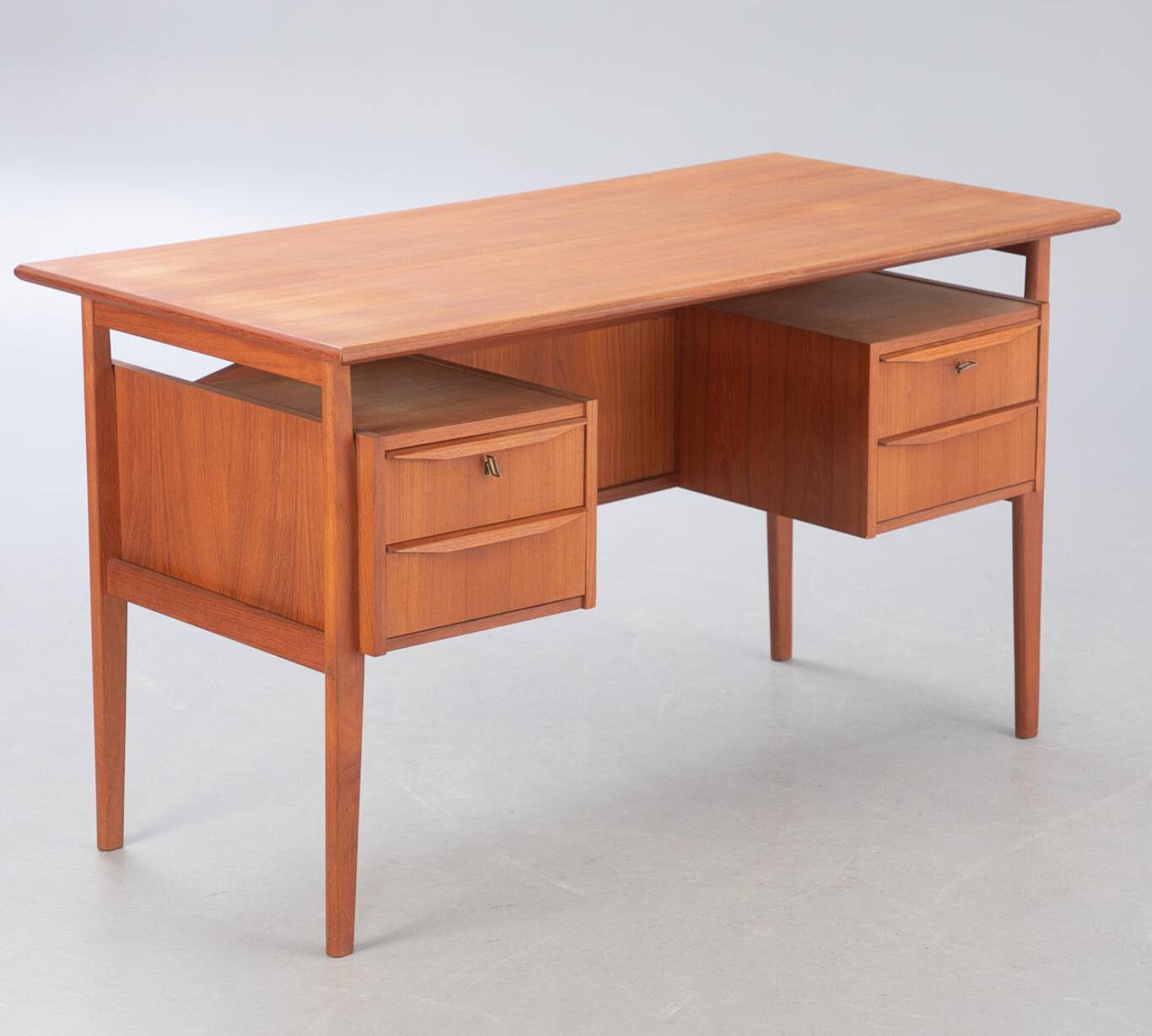Scandinavian double-sided desk in teak by Gunnar Nielsen