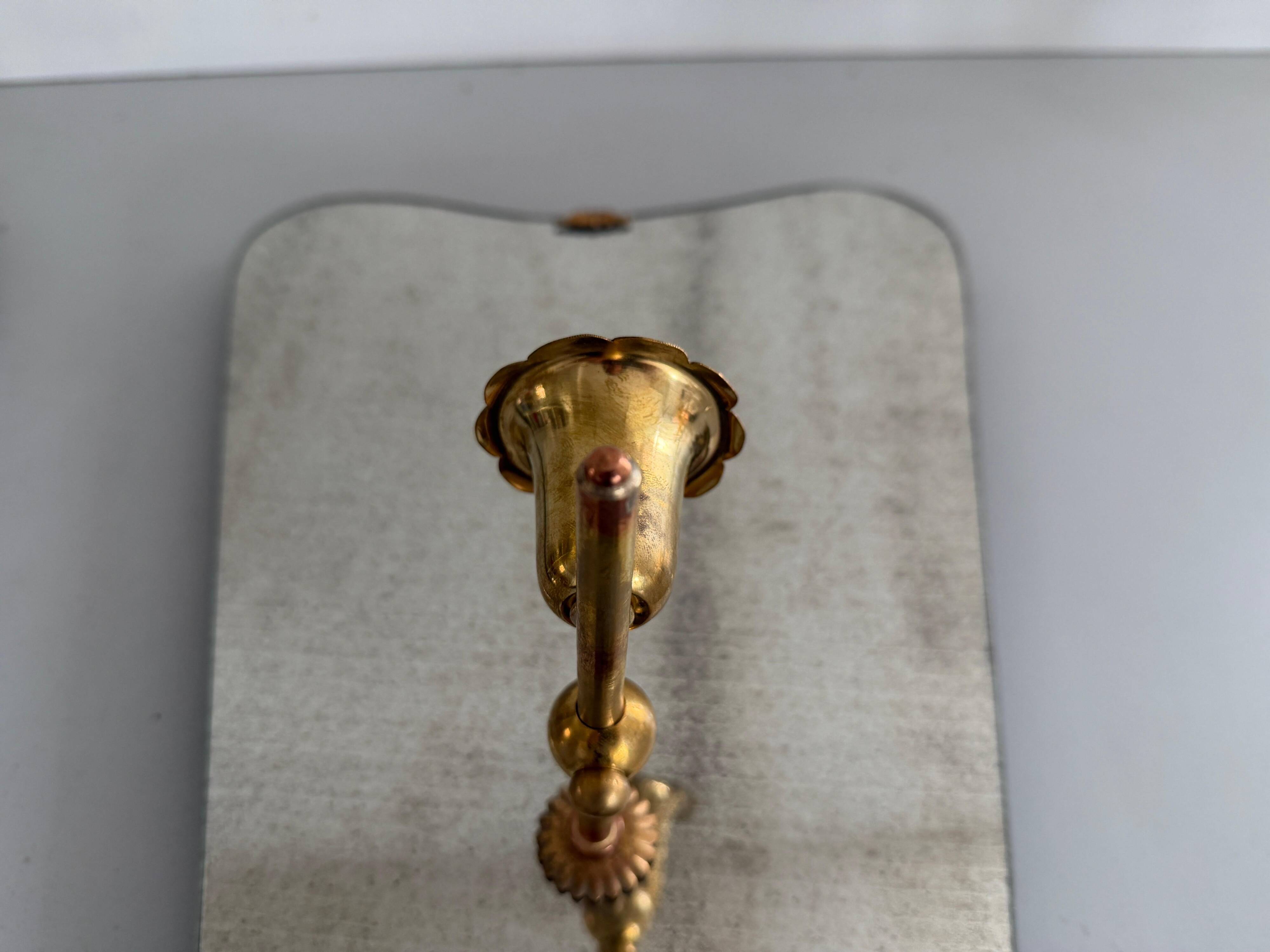 Pair of brass wall lights with mirrors, mid-20th century, Italy, 1960.