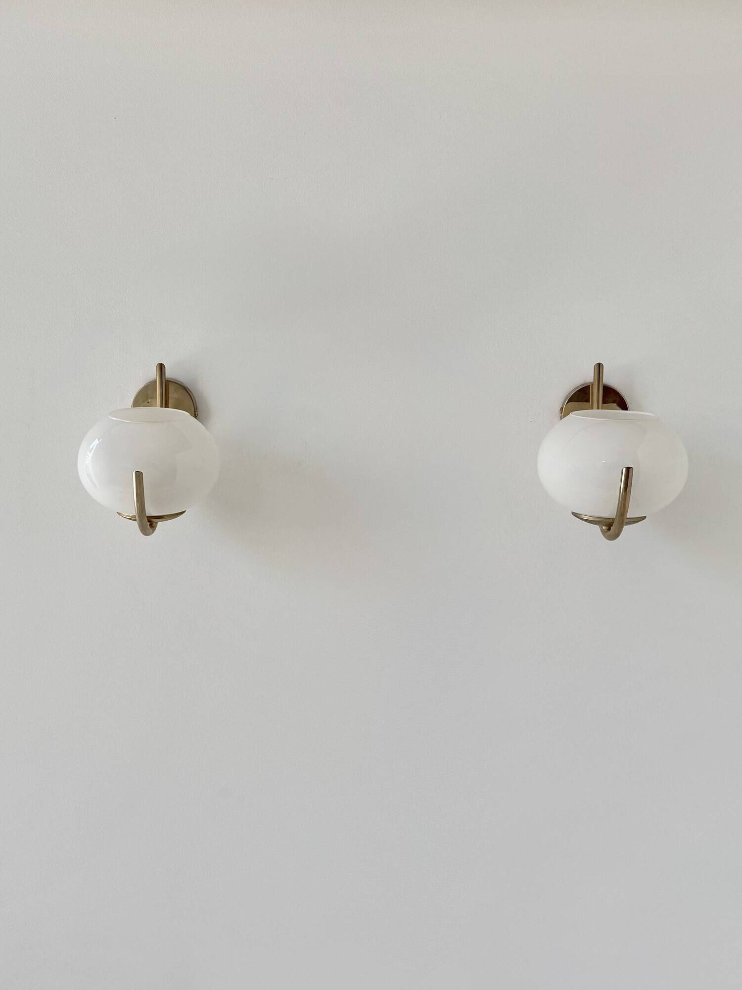 Pair of vintage wall sconces, brass and opaline, France, 1970.