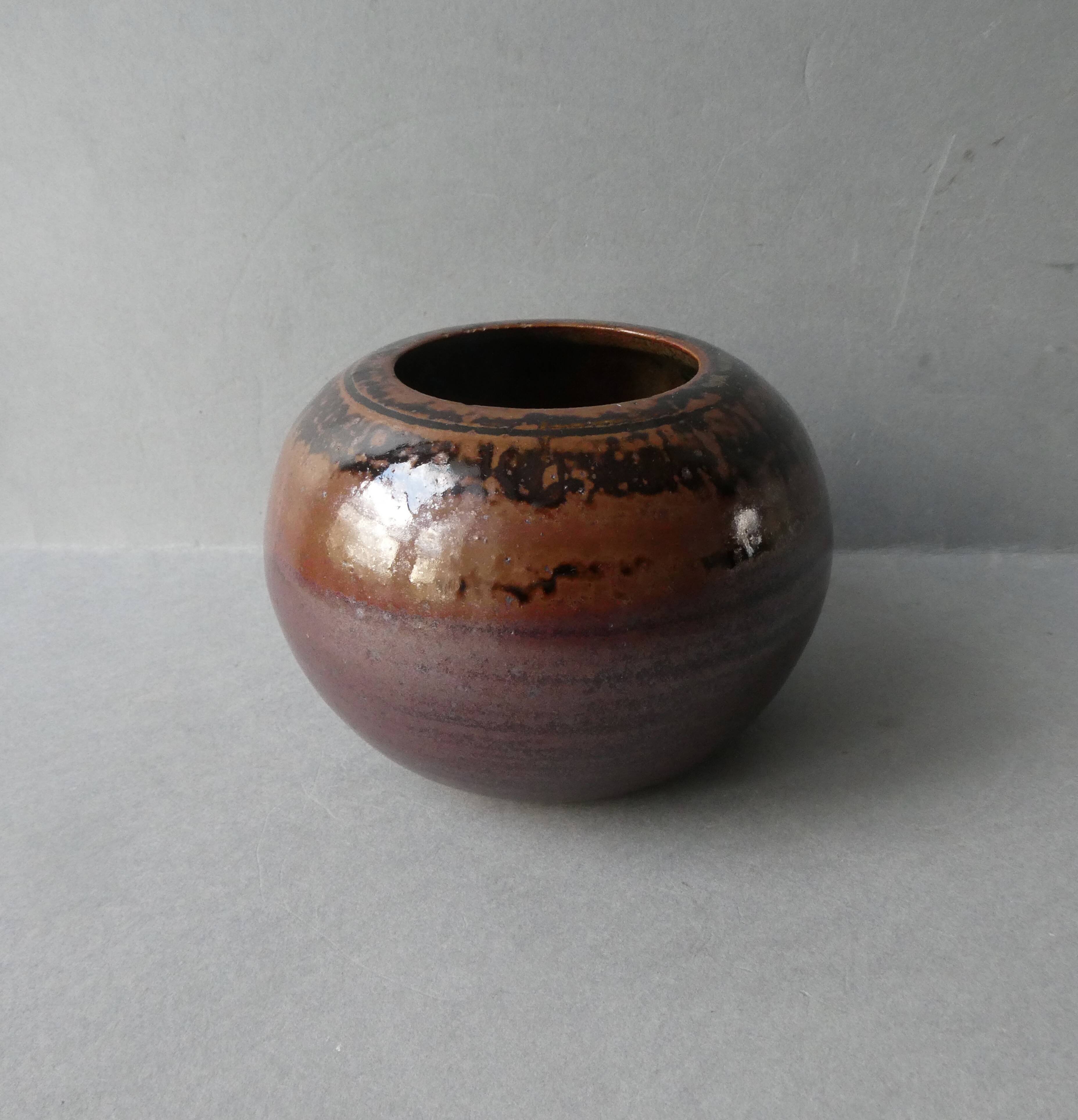 Sandstone ball vase signed Yves Remond