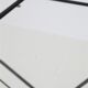 Filigree mid-century modern side table with magazine rack / steel / glass / 1960s