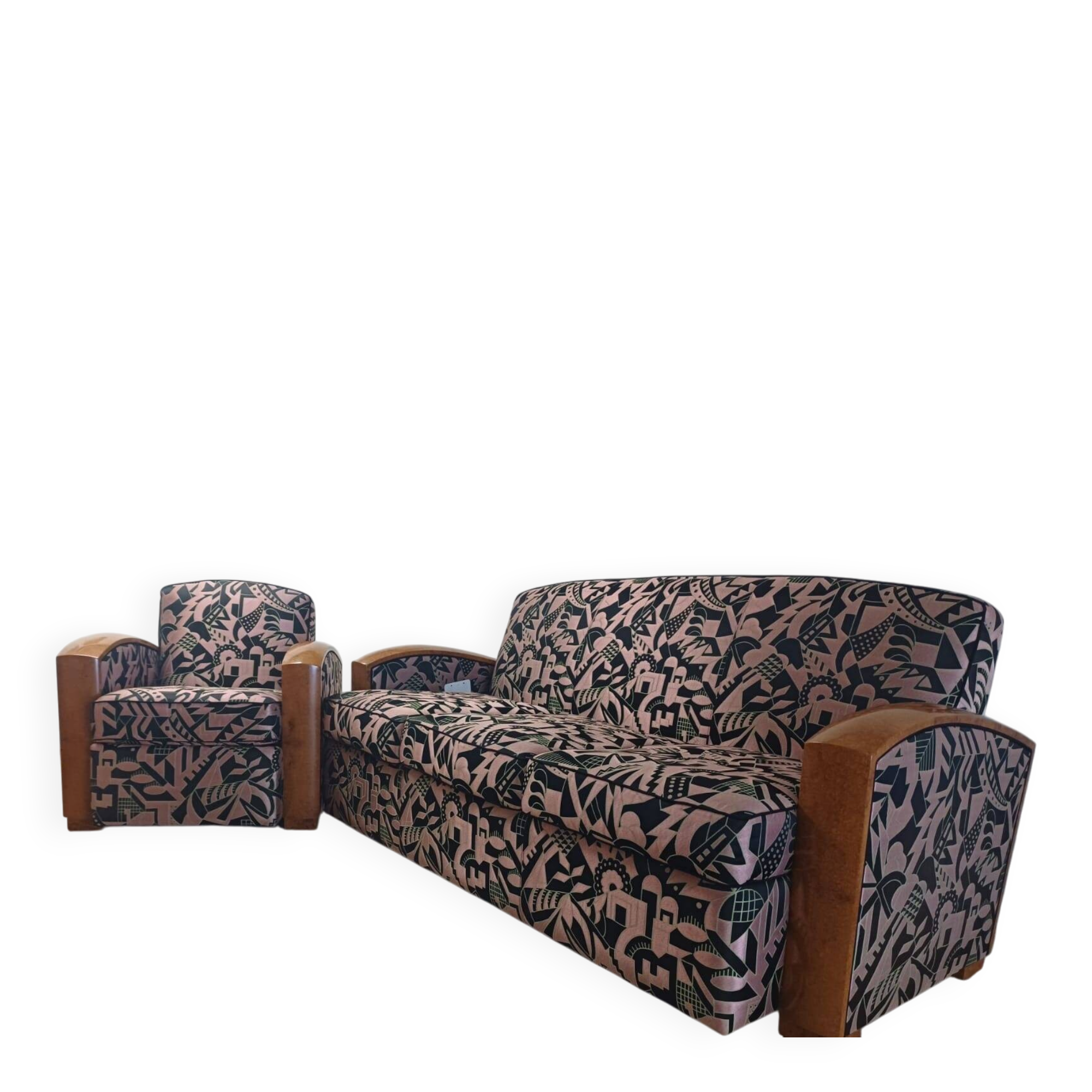 Convertible sofa and art deco armchair in lelievre fabrics.