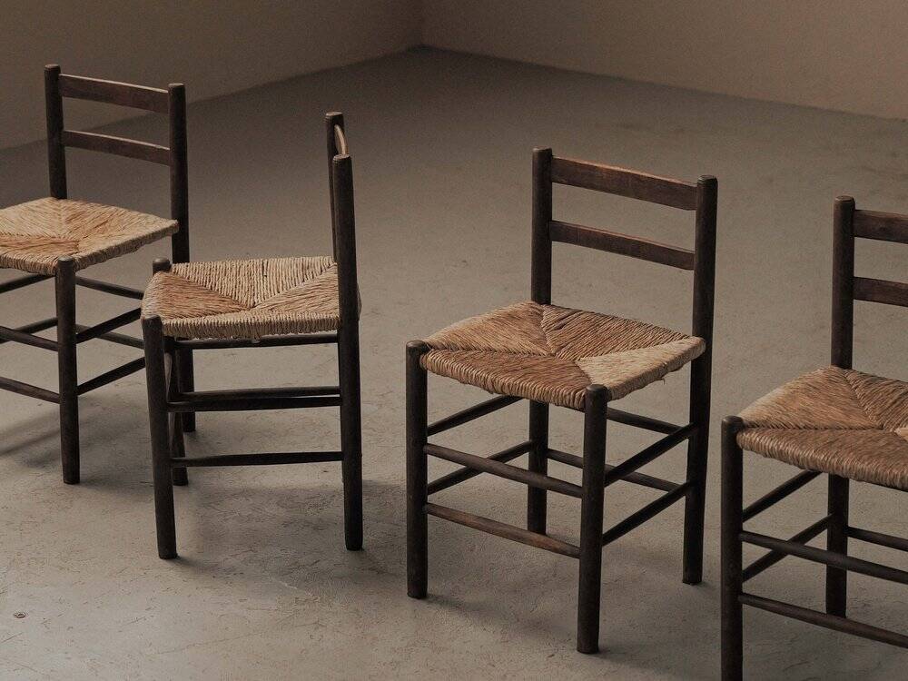 Set of four wooden and straw chairs, around 1960.