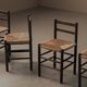 Set of four wooden and straw chairs, around 1960.