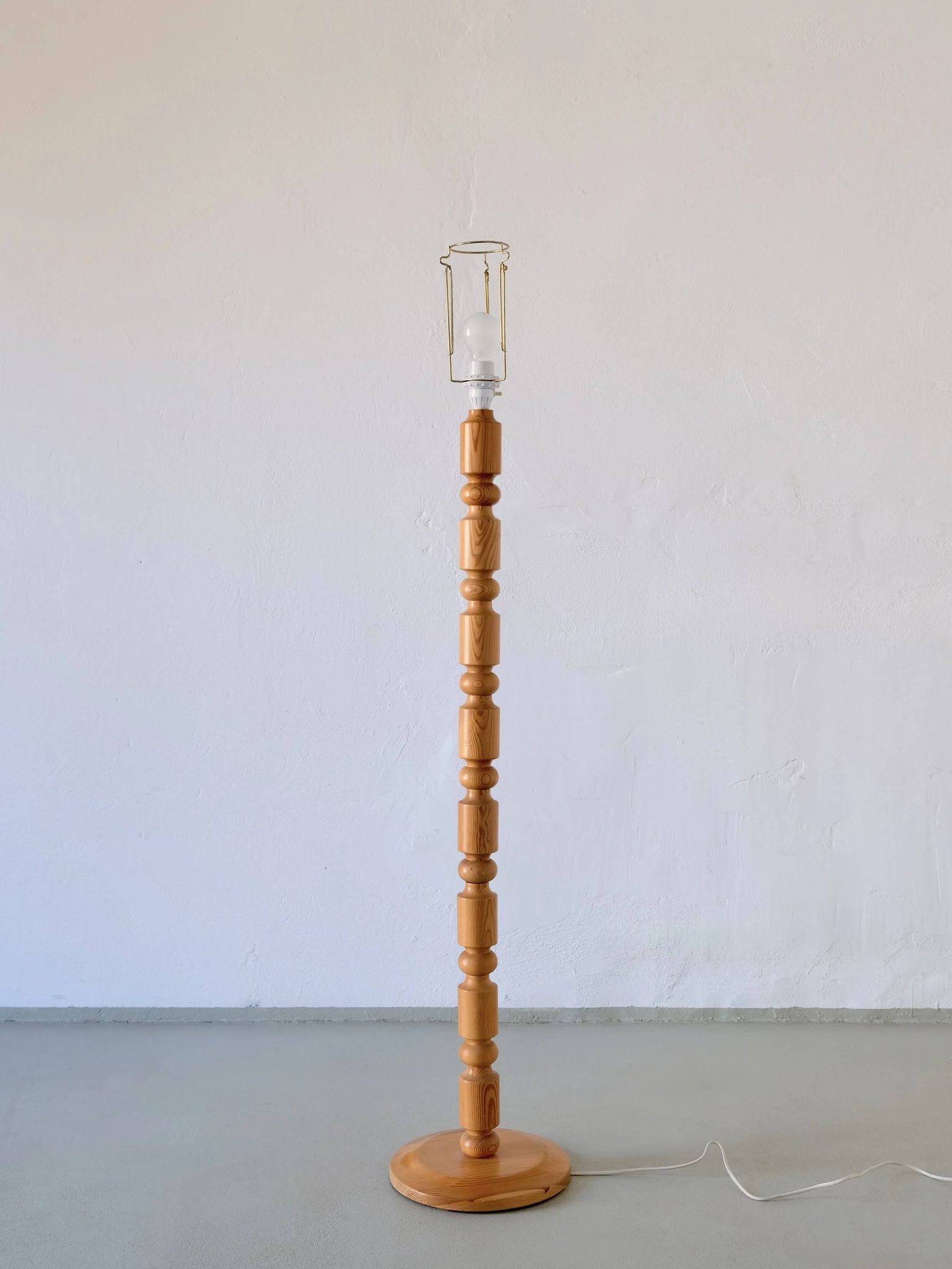 Carved pine floor lamp | Sweden | 1960s