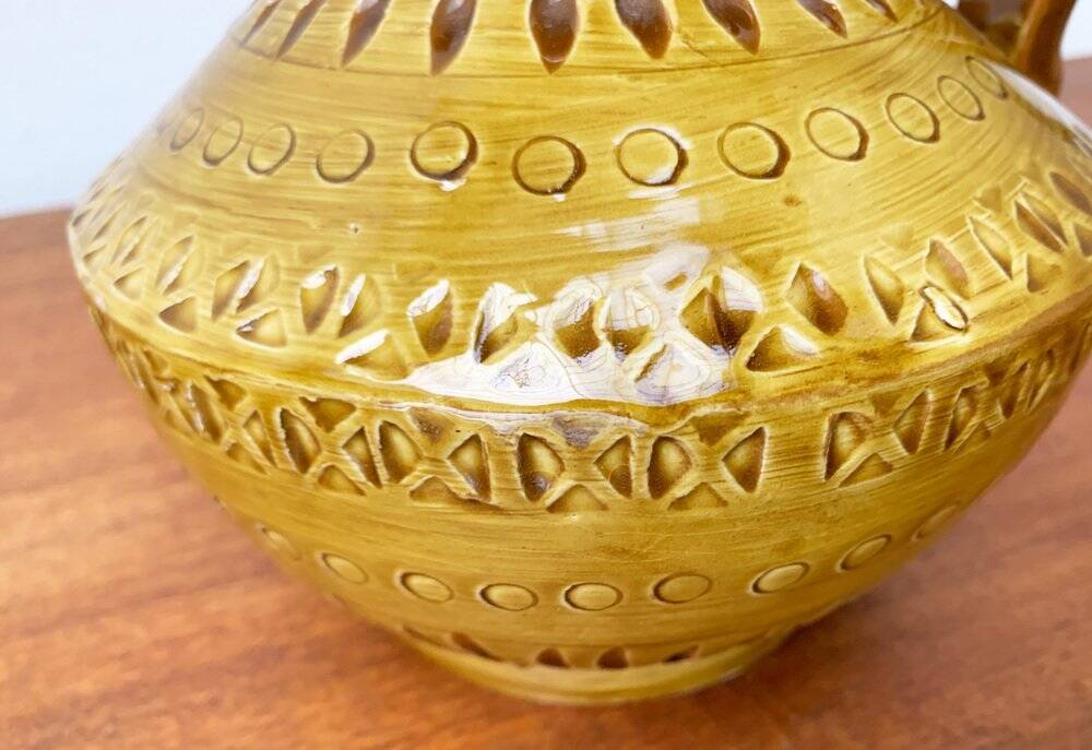 Italian pottery carafe from the mid-century by Aldo Londi for Bitossi, 1960s.