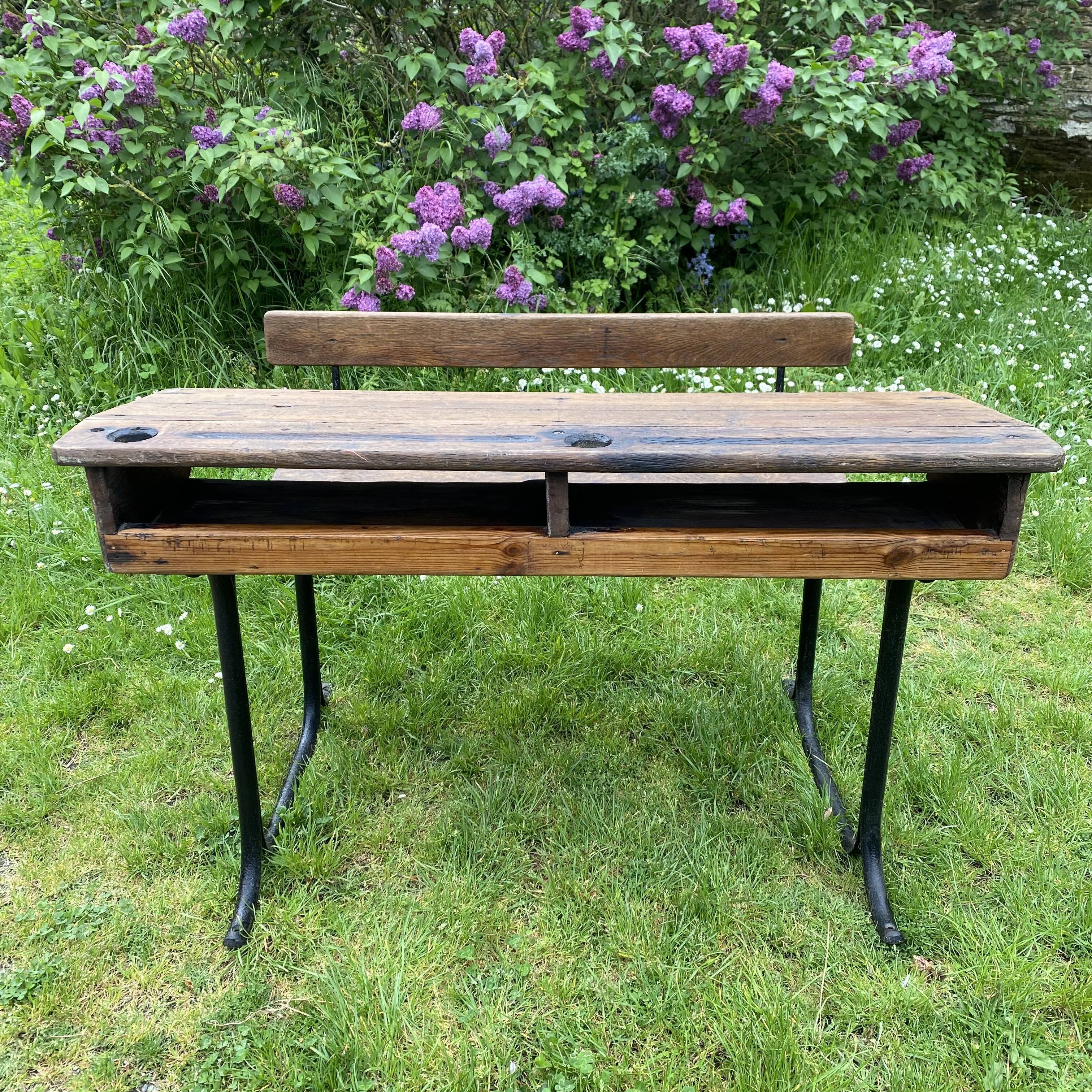 Old school desk in wood and cast iron