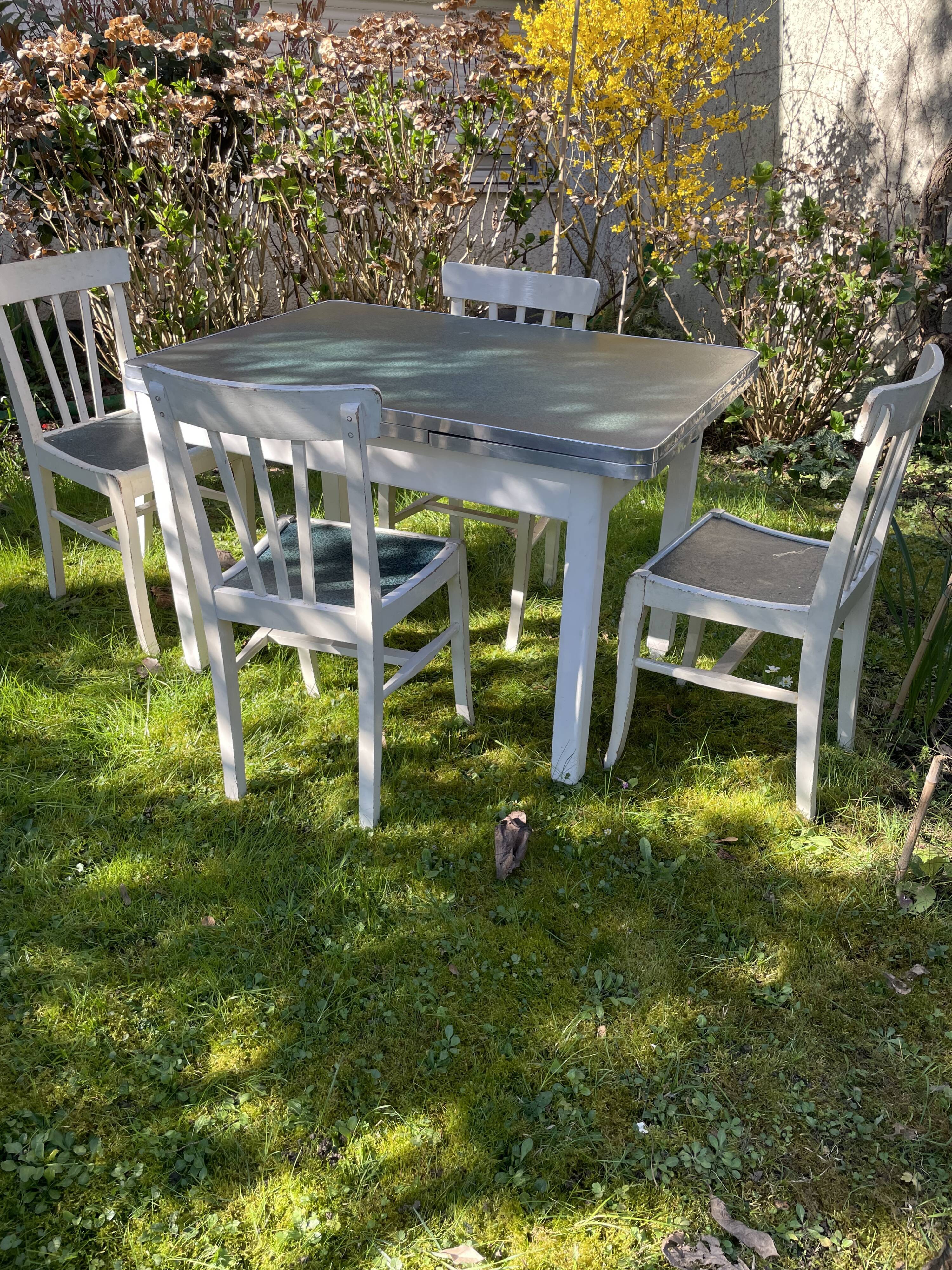Four original 50 year retro white chairs