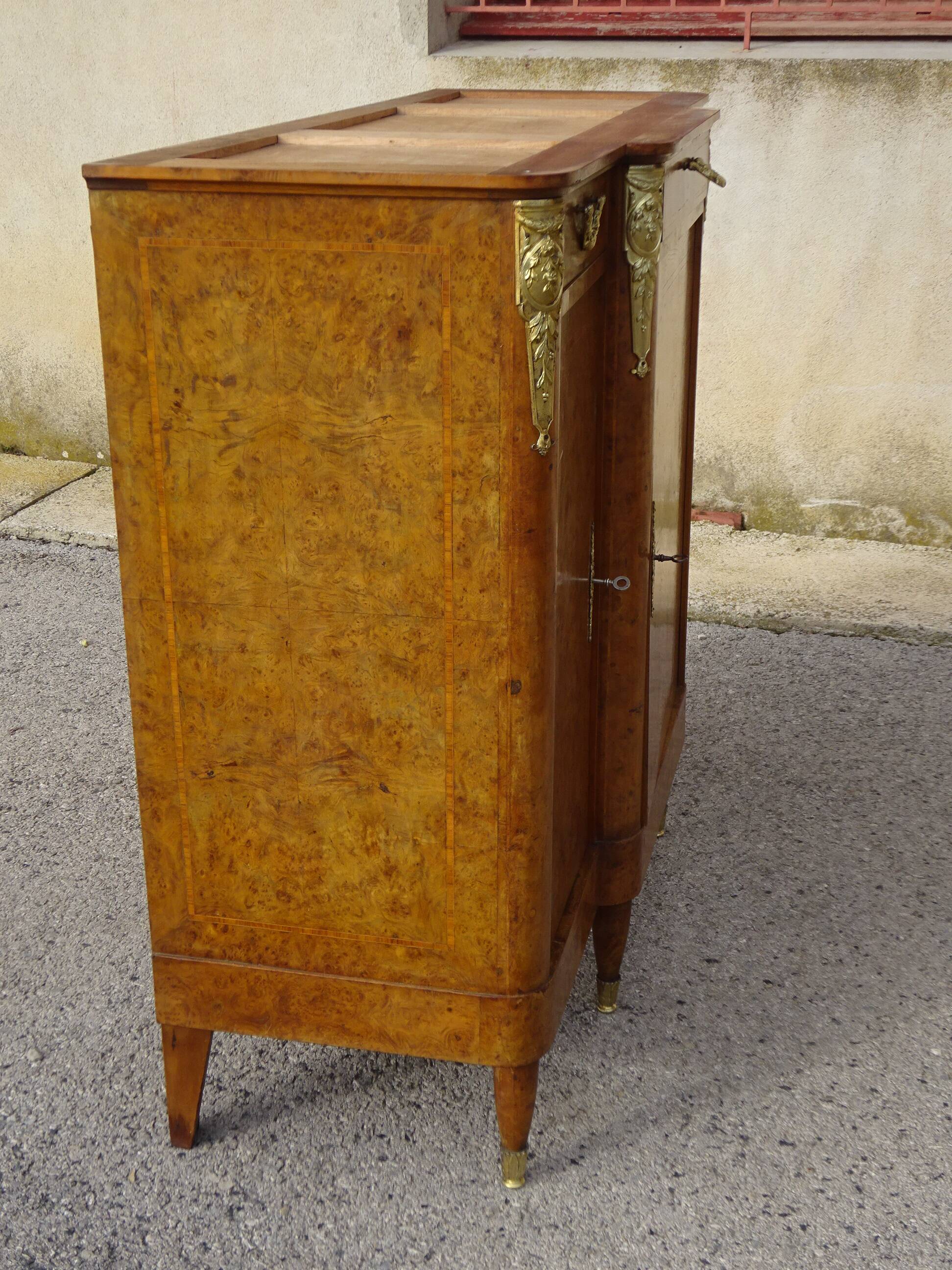 Louis XVI style walnut burl buffet with gilt bronze mounts