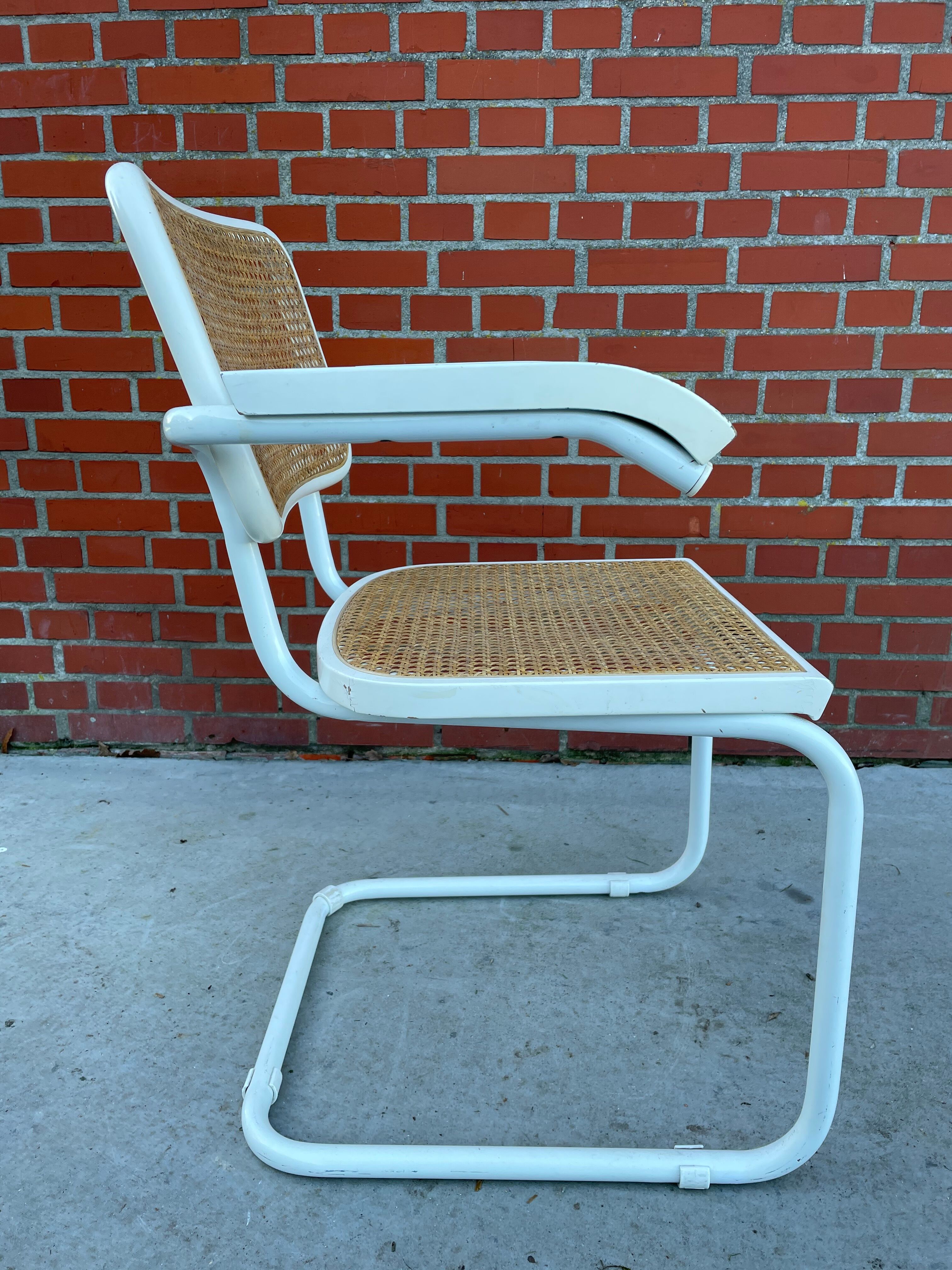 Cesca Chair model with armrest in white