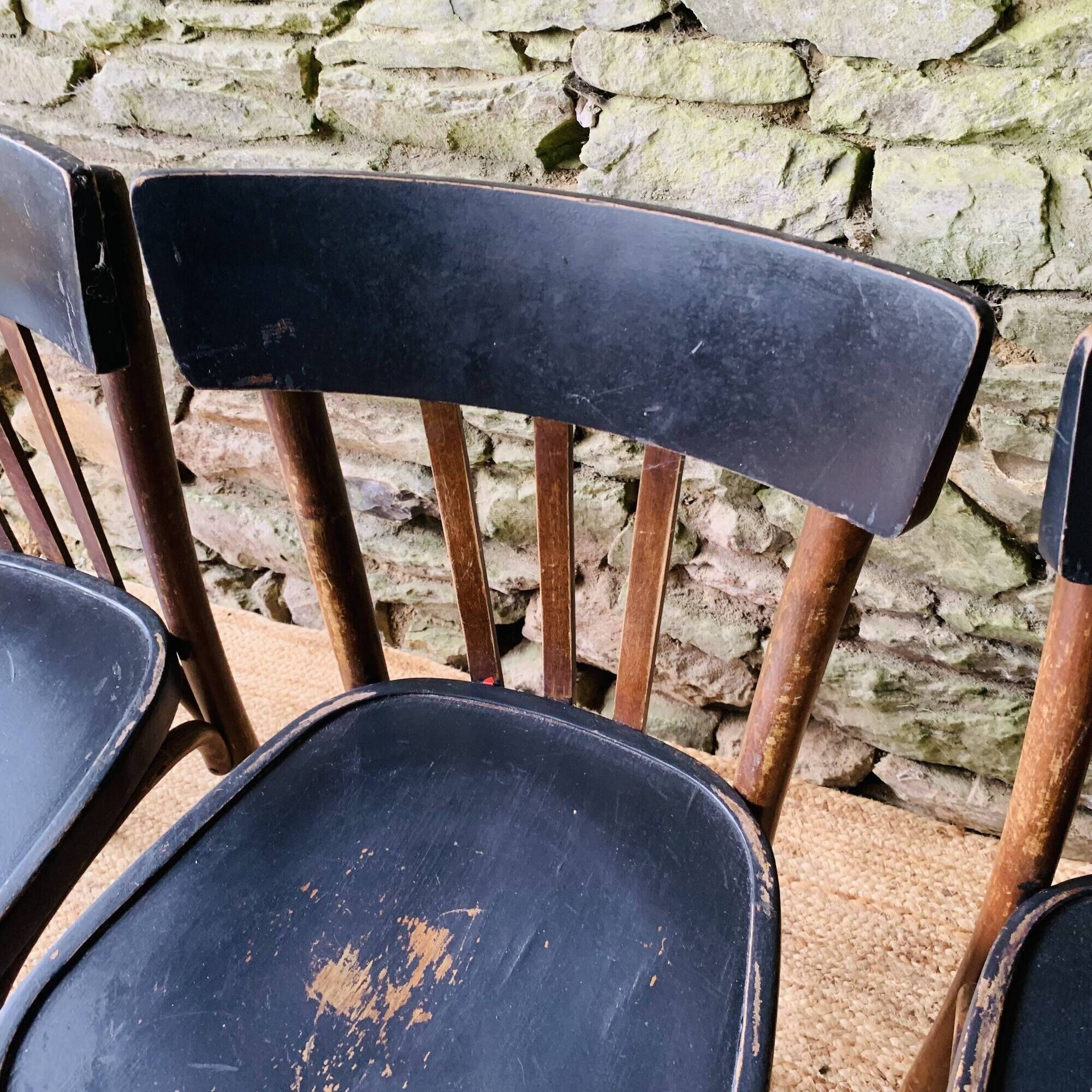 Set of four vintage bentwood bistro chairs.