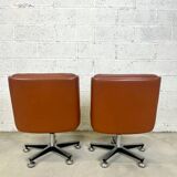 Pair of brown leather armchairs 1980