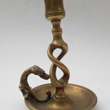 Antique bronze candlestick with dragon-shaped handle from the 17th century