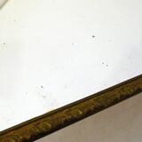 Large elongated gilded mirror