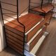 Vintage modular wall-mounted library shelf in blond walnut 1960-80