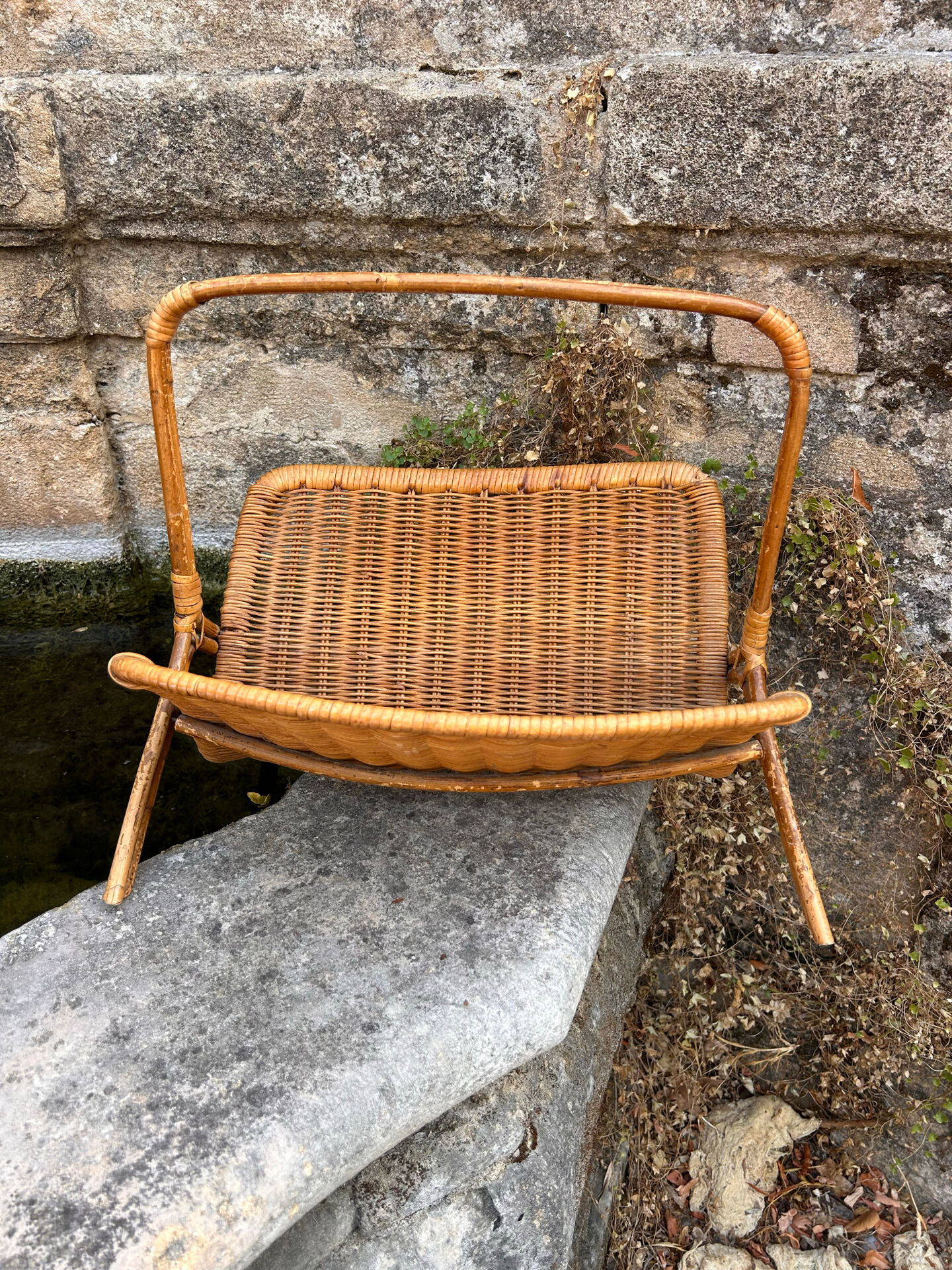 Rattan magazine rack