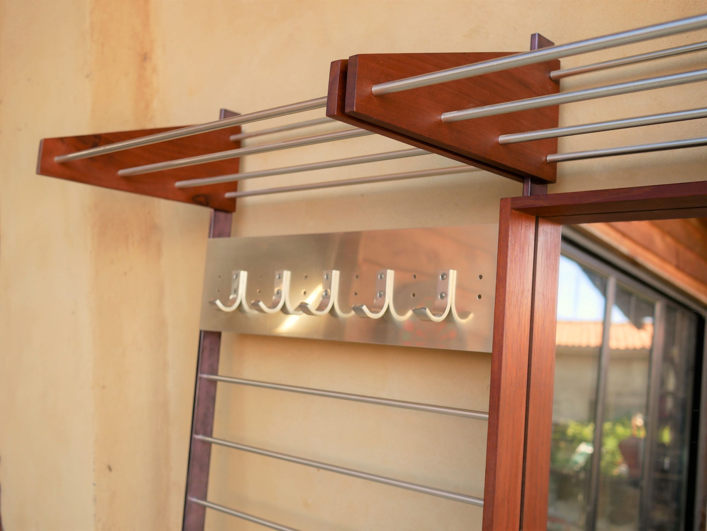 Vintage Scandinavian teak and aluminum coat holder