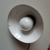Articulated vintage red metal factory desk lamp
