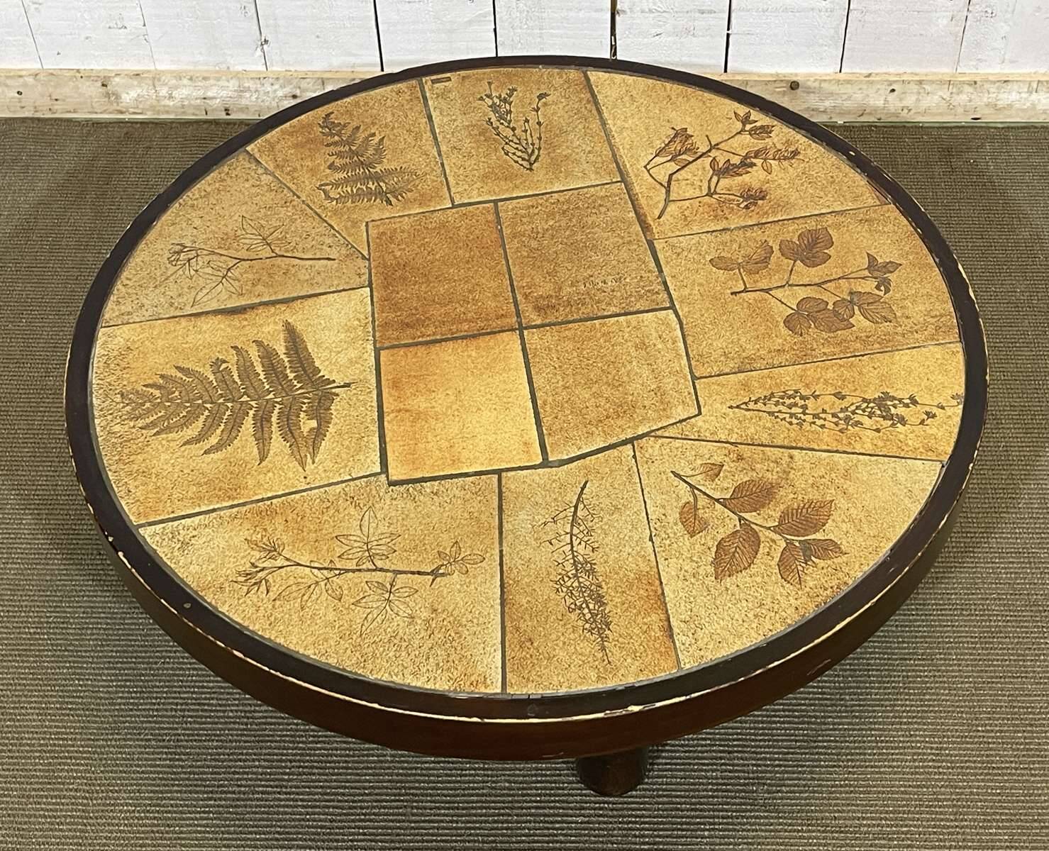Beech coffee table with a ceramic top featuring a herbarium design.