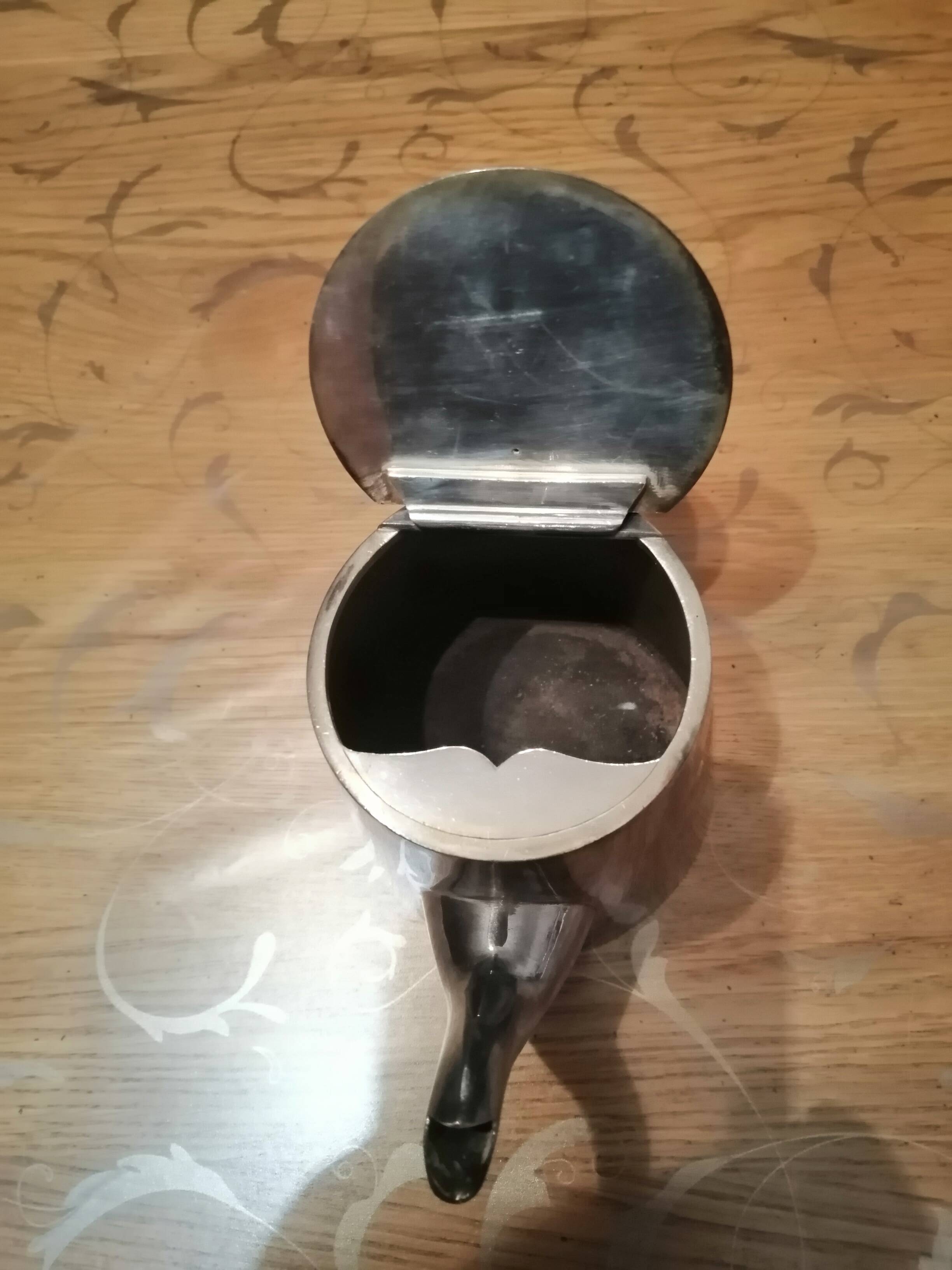 silver-plated teapot