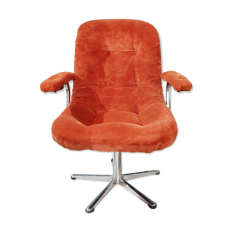 Orange velvet swivel armchair