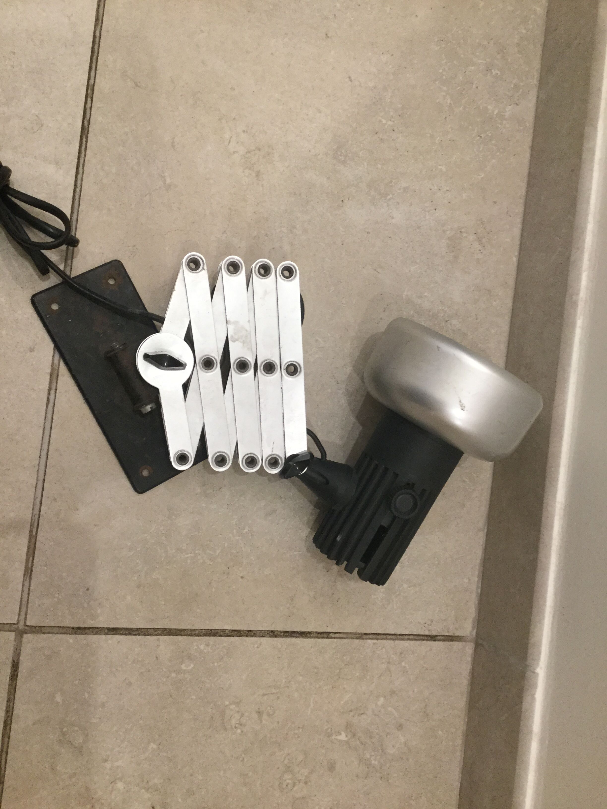 Industrial accordion wall light