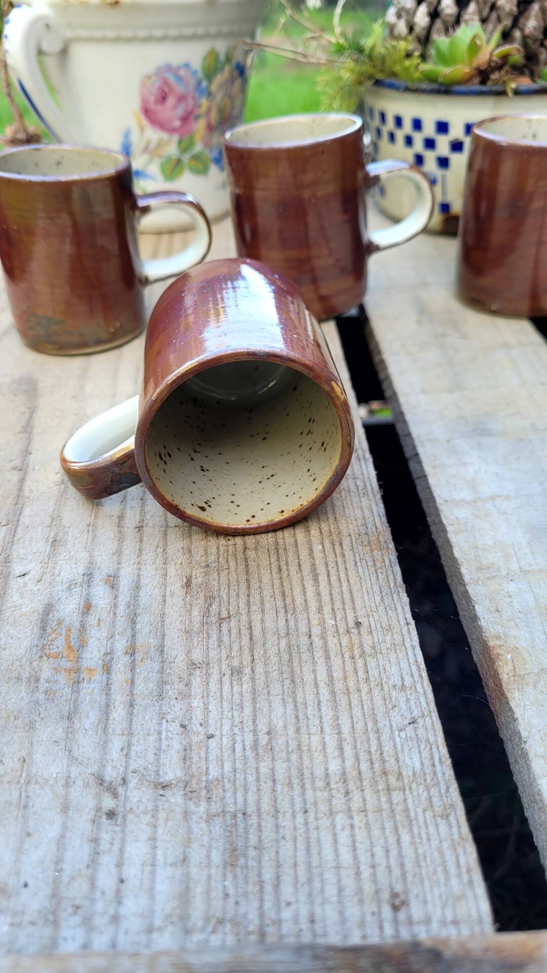 Vintage iridescent stoneware coffee mug.