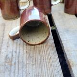 Vintage iridescent stoneware coffee mug.