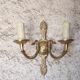 Pair of Empire style bronze wall lights, bronze wall light with palmette and swan neck.