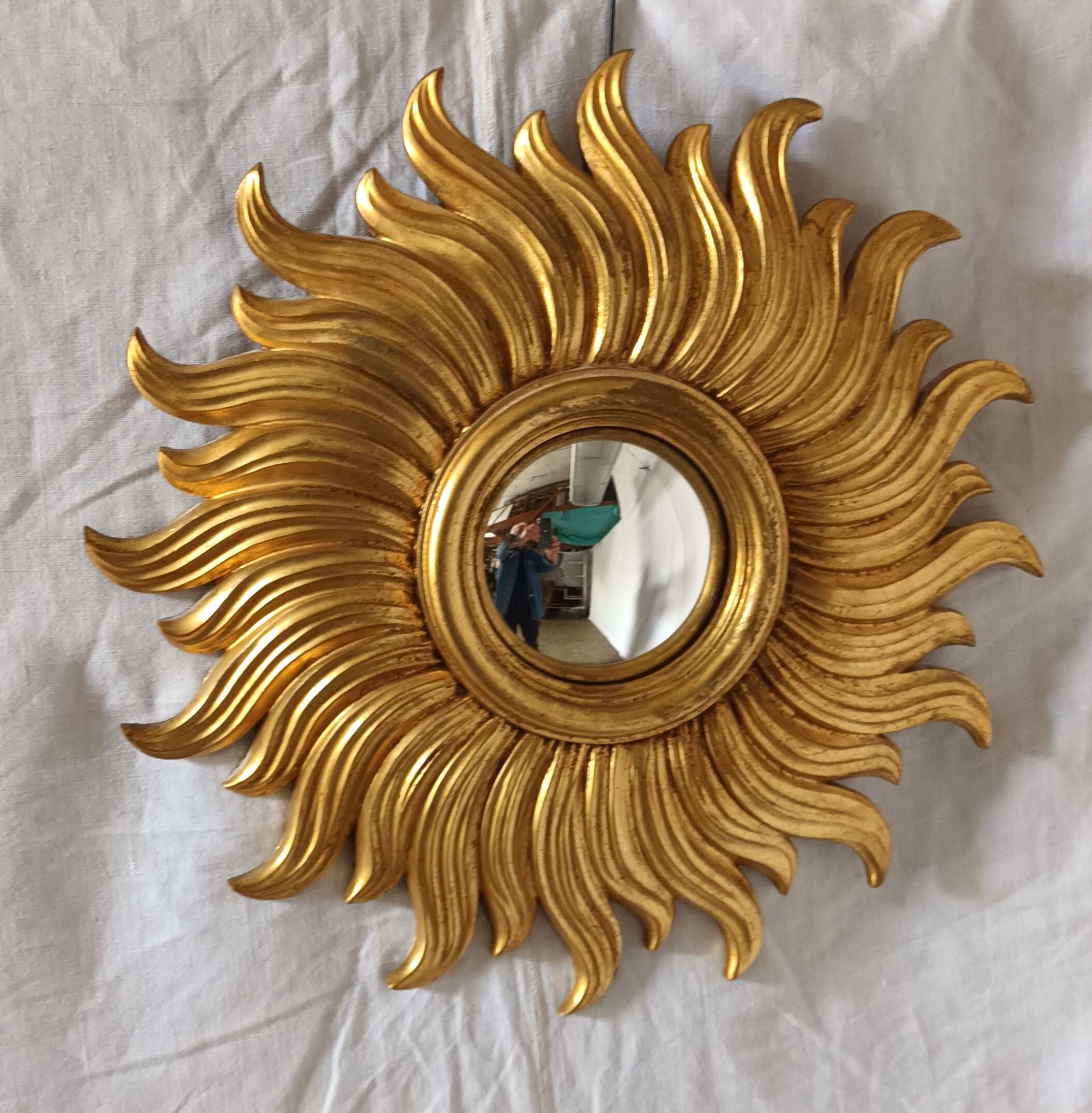 Miroir soleil en bois doré des années 90